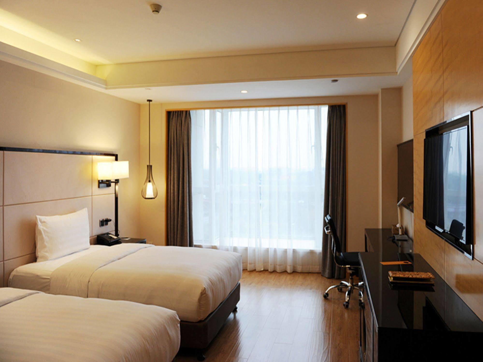 Hotel Pullman Qingdao Ziyue Zewnętrze zdjęcie